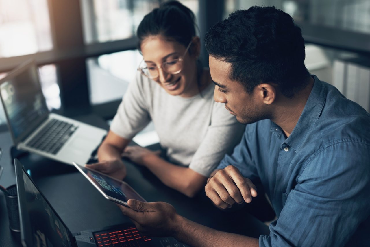 shot-of-two-young-workers-using-a-digital-tablet-in-a-modern-office.jpg shot-of-two-young-workers-using-a-digital-tablet-in-a-modern-office.jpg